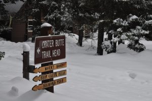 Crater Butte Trailhead sign in the snow