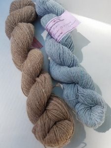 Two skeins of lovely yarn from last year's giveaway.
